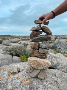Making a tower of rocks Sagres